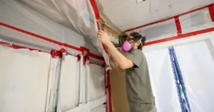 Homeowner isolating moldy areas in his home