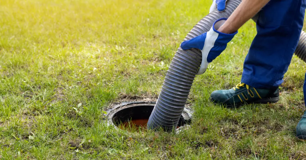 Checking septic tank for signs of flooded septic tank