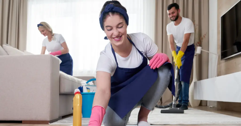 Cleaners working in a home after a hoarding cleanup