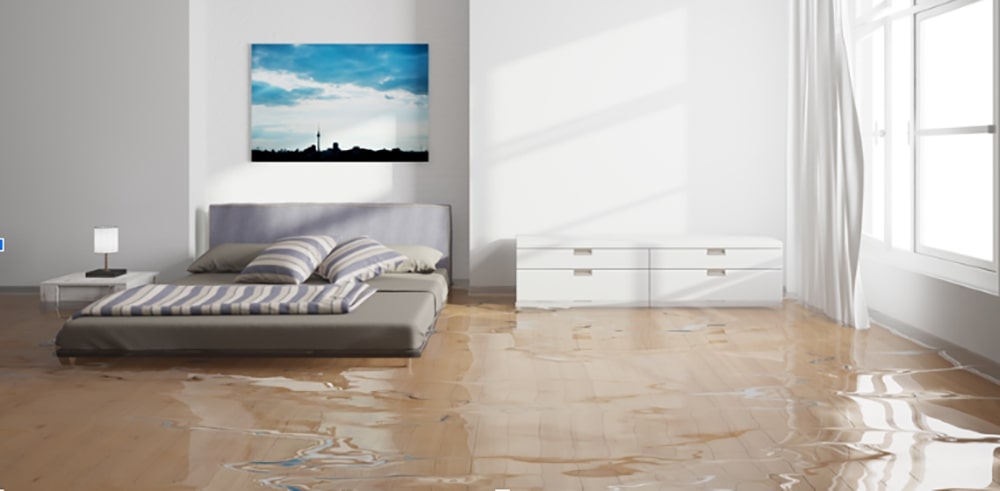 a bedroom damaged by flooding
