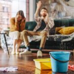 a water leak in a young couple's home